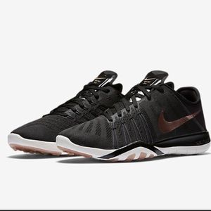 Black and bronze Nike Free Tr6
